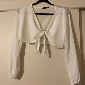 Boohoo bralette style crop top.